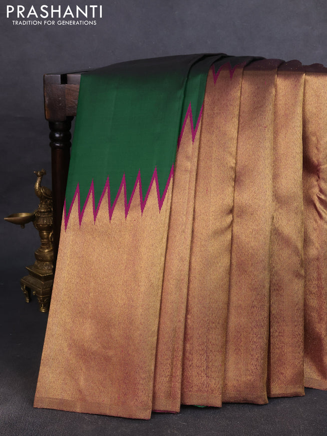 Pure kanchipuram silk saree green and purple with plain body and rising border