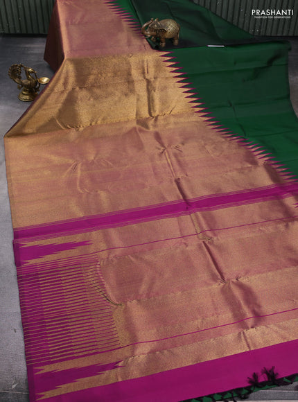 Pure kanchipuram silk saree green and purple with plain body and rising border