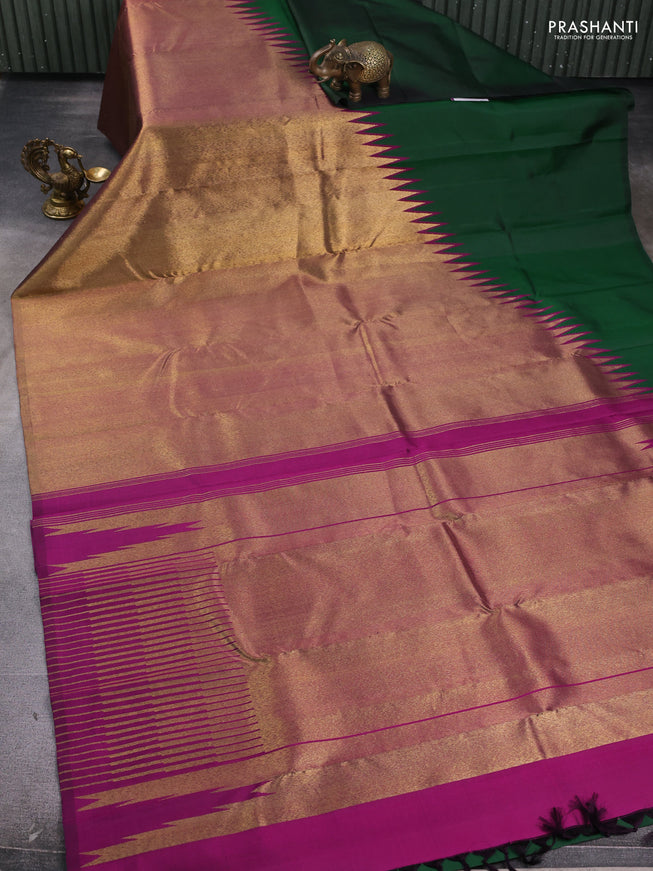 Pure kanchipuram silk saree green and purple with plain body and rising border