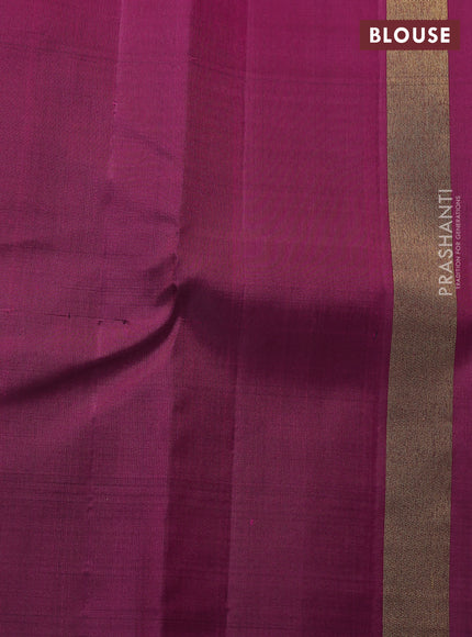 Pure kanchipuram silk saree green and purple with plain body and rising border