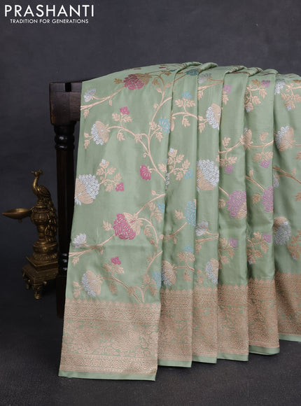 Banarasi silk saree pastel green with allover zari weaves and zari woven border