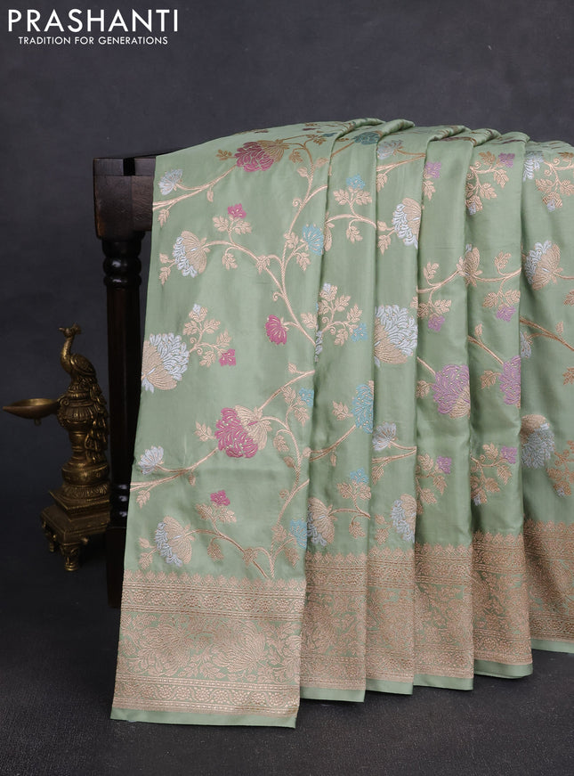 Banarasi silk saree pastel green with allover zari weaves and zari woven border