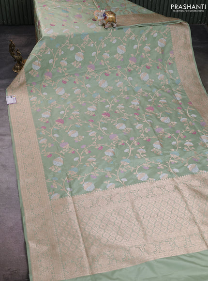 Banarasi silk saree pastel green with allover zari weaves and zari woven border