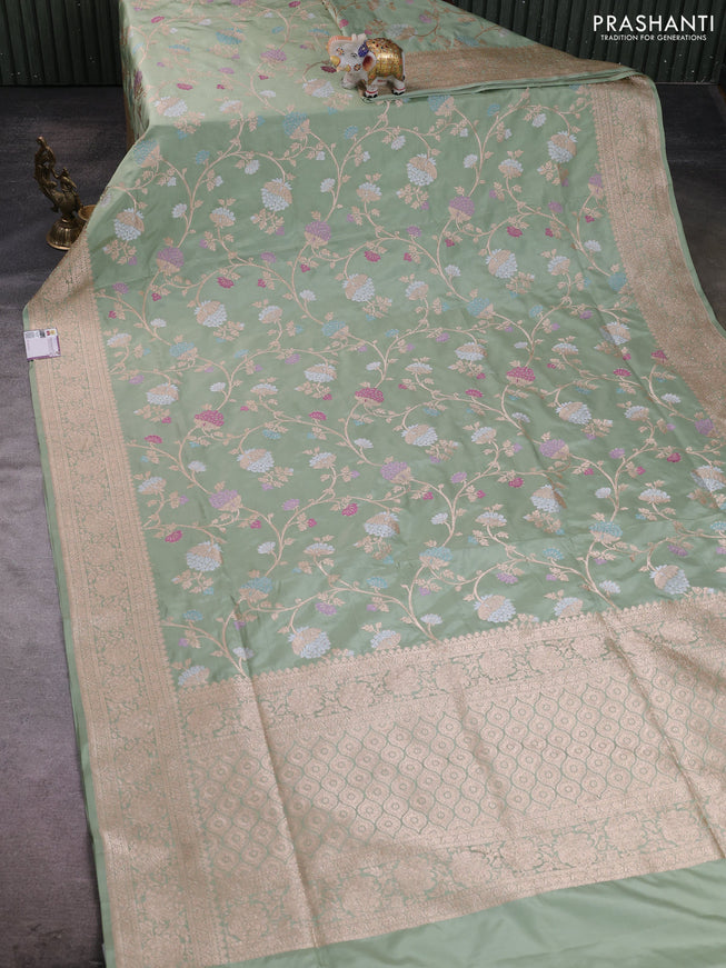 Banarasi silk saree pastel green with allover zari weaves and zari woven border