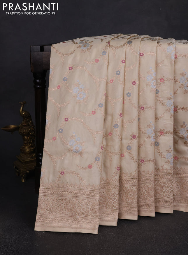 Banarasi silk saree cream with allover zari weaves and zari woven border