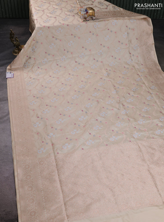 Banarasi silk saree cream with allover zari weaves and zari woven border
