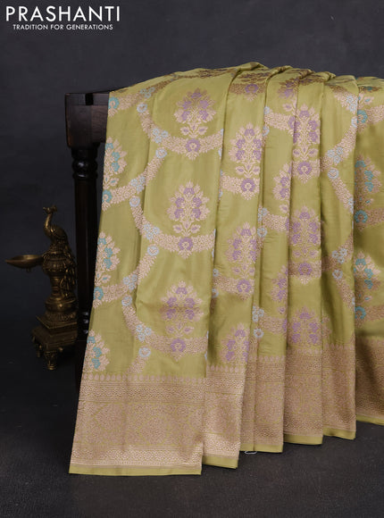 Banarasi silk saree pista green with allover zari weaves and zari woven border