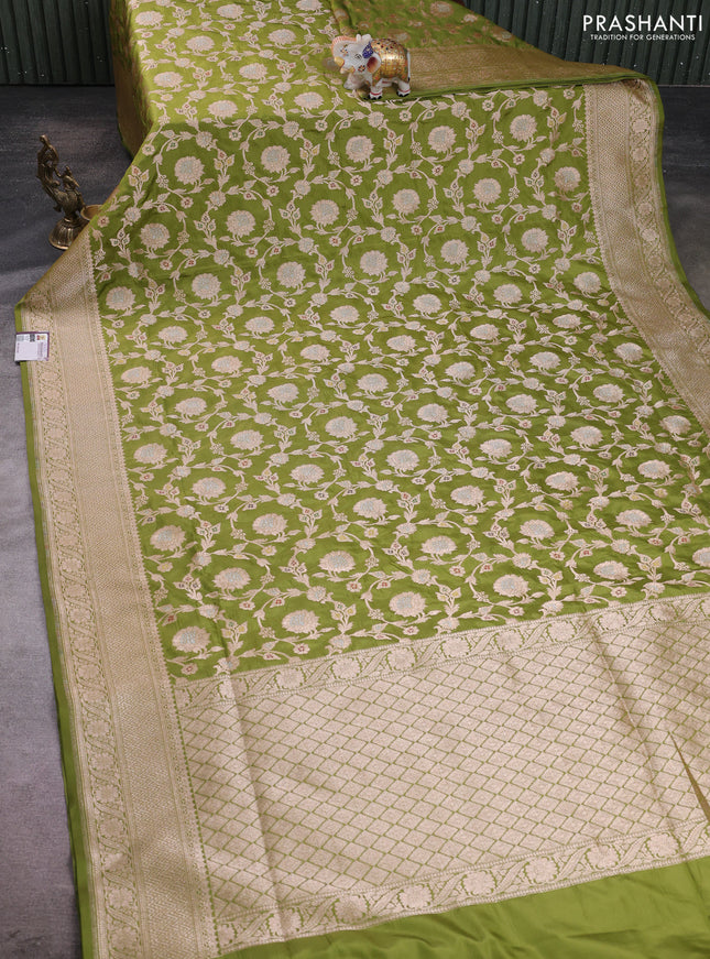 Banarasi silk saree mehendi green with allover zari weaves and zari woven border