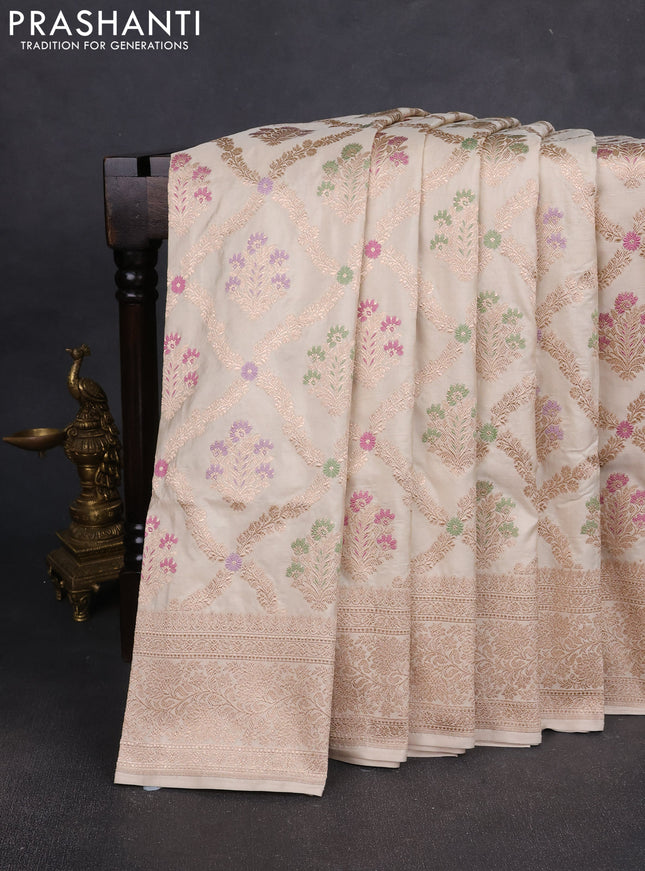 Banarasi silk saree cream with allover zari weaves and zari woven border