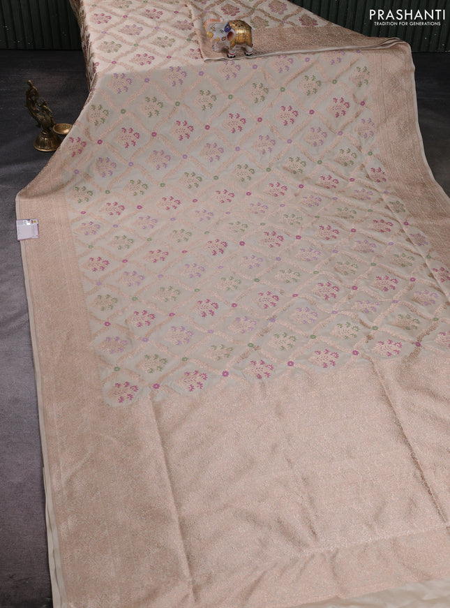 Banarasi silk saree cream with allover zari weaves and zari woven border