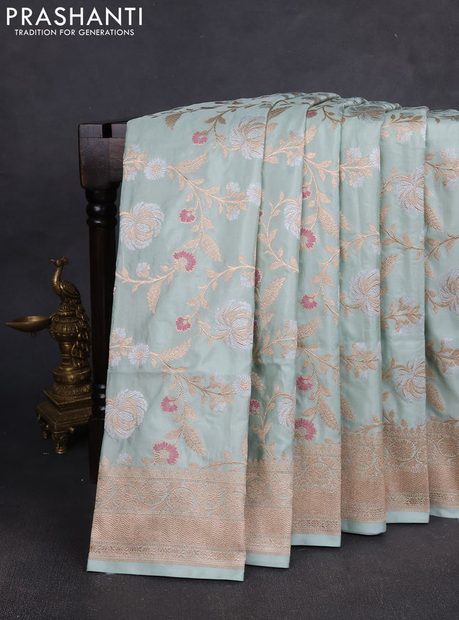 Banarasi silk saree pastel green with allover zari weaves and zari woven border