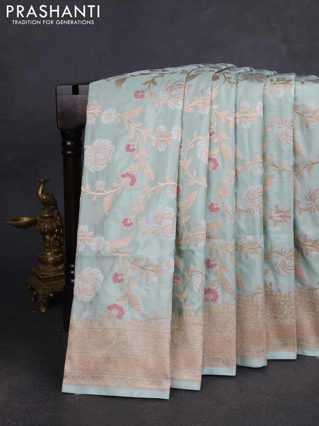 Banarasi silk saree pastel green with allover zari weaves and zari woven border