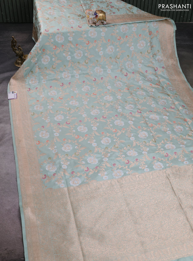 Banarasi silk saree pastel green with allover zari weaves and zari woven border