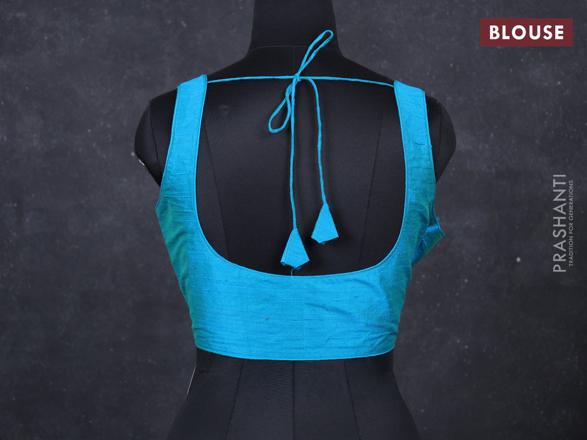 Teal blue raw silk readymade blouse teal blue and Sleeveless style