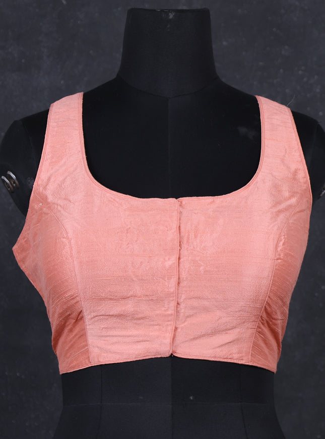 Peach raw silk readymade blouse peach and Sleeveless style