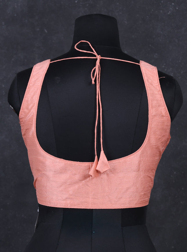 Peach raw silk readymade blouse peach and Sleeveless style