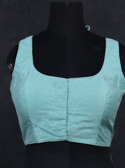 Teal raw silk readymade blouse Teal and Sleeveless style