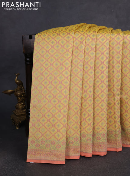 Banarasi silk cotton saree yellow with allover thread weaves and woven border