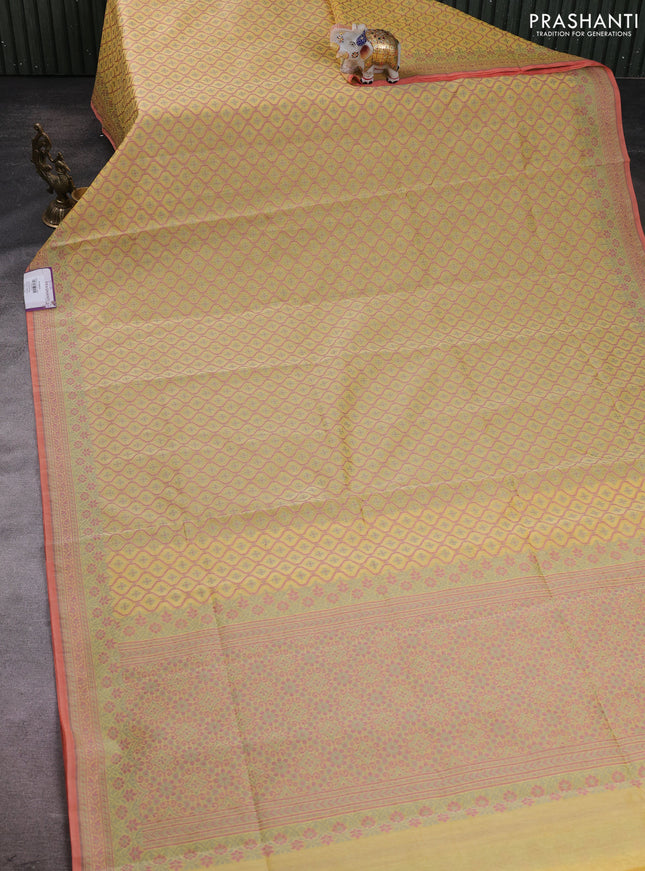 Banarasi silk cotton saree yellow with allover thread weaves and woven border