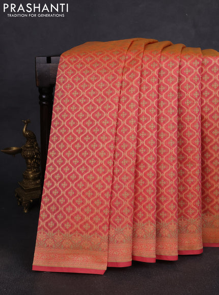 Banarasi silk cotton saree peach orange with allover thread weaves and woven border
