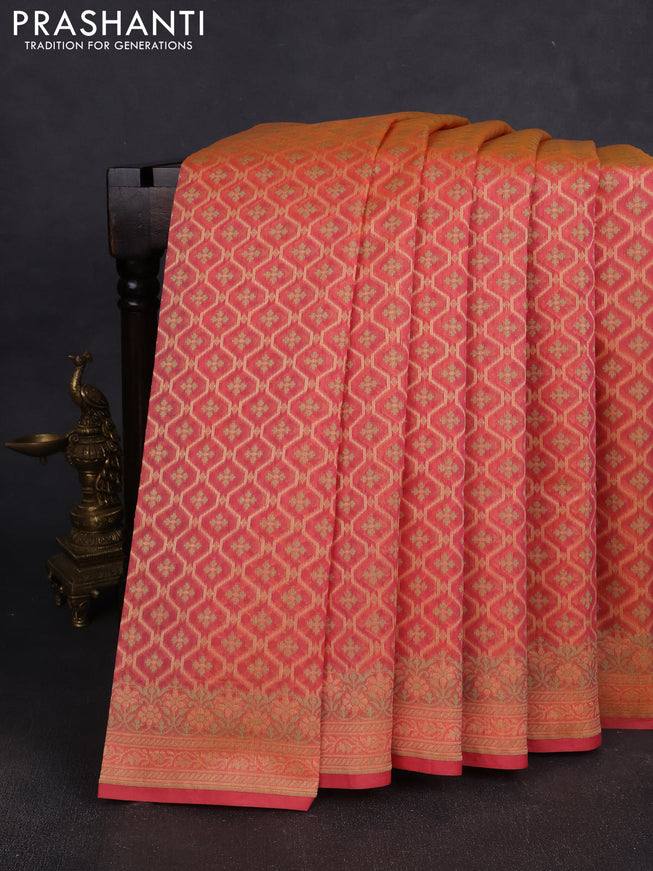 Banarasi silk cotton saree peach orange with allover thread weaves and woven border