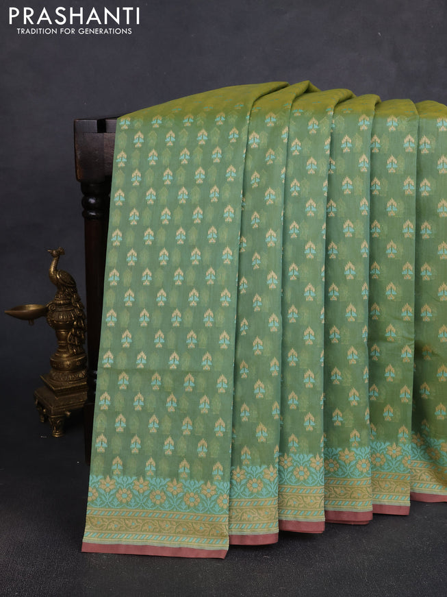 Banarasi silk cotton saree green shade with allover thread weaves and woven border