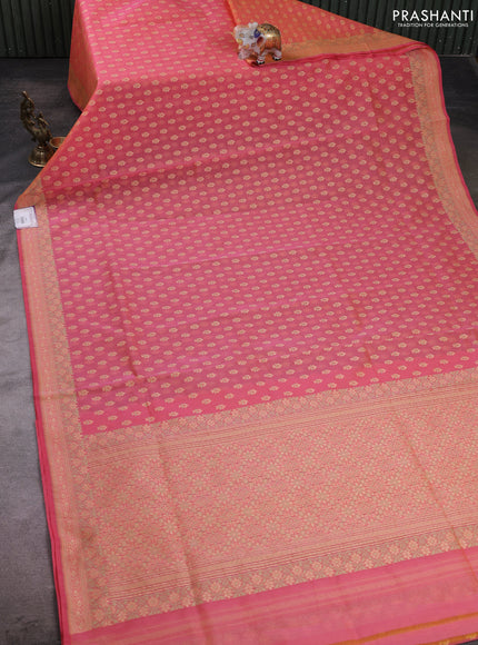 Banarasi silk cotton saree peach pink with allover thread weaves and woven border