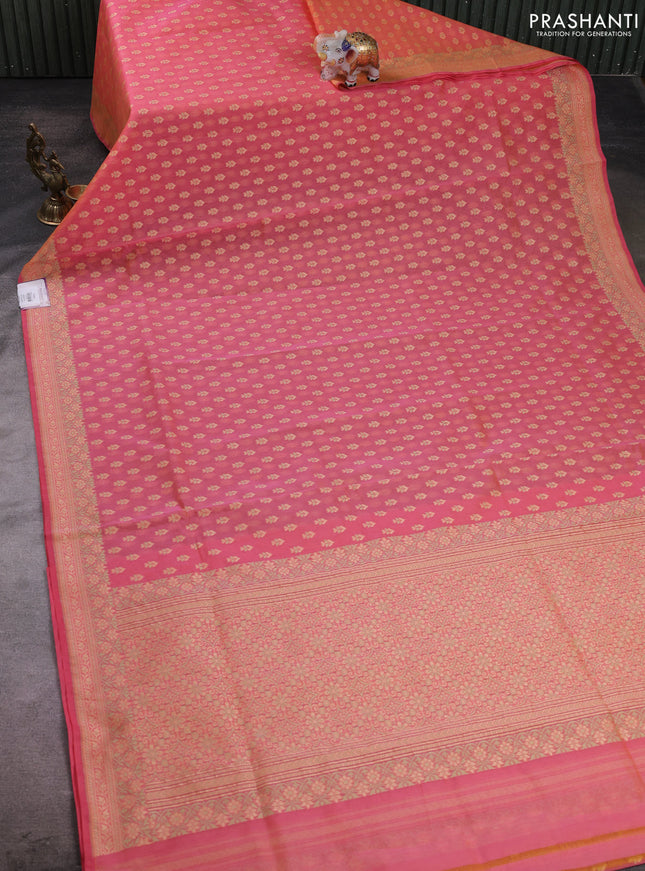 Banarasi silk cotton saree peach pink with allover thread weaves and woven border