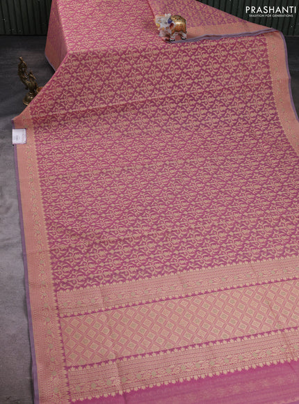 Banarasi silk cotton saree peach pink with allover thread weaves and woven border