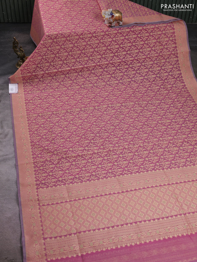 Banarasi silk cotton saree peach pink with allover thread weaves and woven border