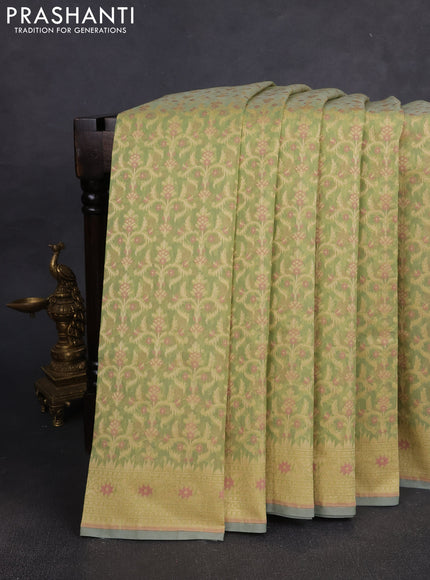 Banarasi silk cotton saree pista green with allover thread weaves and woven border