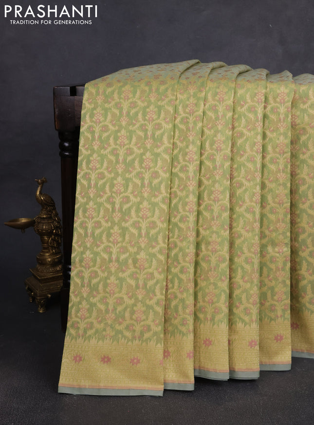 Banarasi silk cotton saree pista green with allover thread weaves and woven border