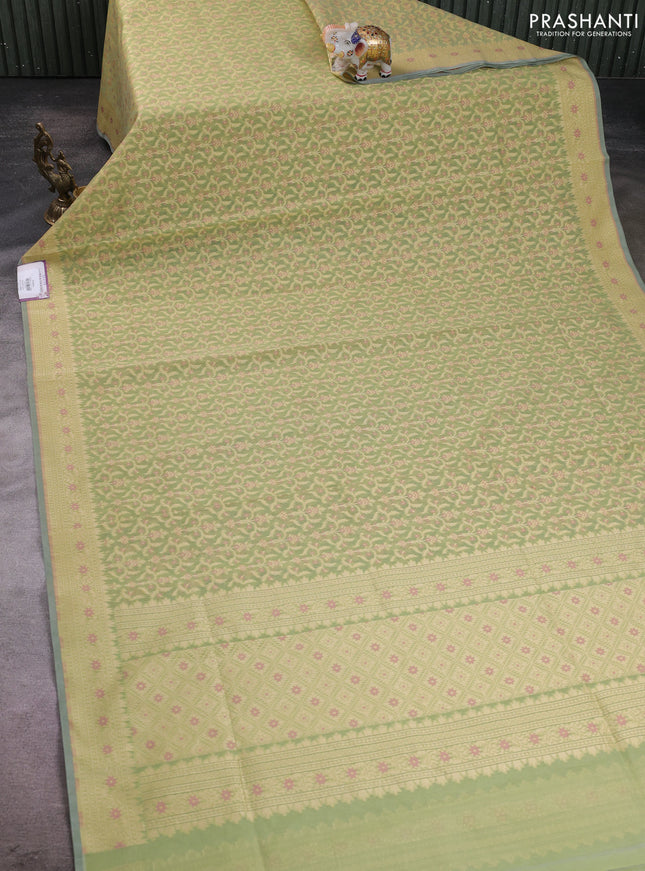 Banarasi silk cotton saree pista green with allover thread weaves and woven border
