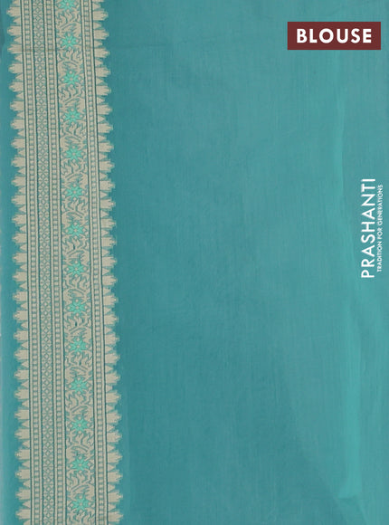 Banarasi silk cotton saree teal shade with allover thread weaves and woven border