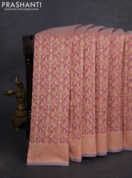 Banarasi silk cotton saree peach shade with allover thread weaves and woven border