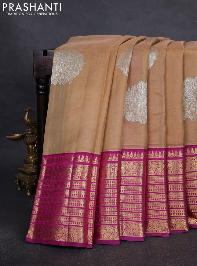 Pure Kora kanchipuram silk saree sandal and purple with silver zari woven coin buttas and long zari woven border