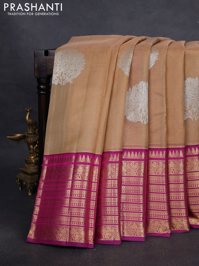 Pure Kora kanchipuram silk saree sandal and purple with silver zari woven coin buttas and long zari woven border