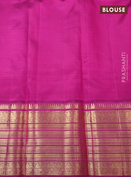 Pure Kora kanchipuram silk saree sandal and purple with silver zari woven coin buttas and long zari woven border