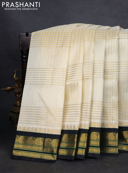 Silk cotton saree off white and dark bottle green with allover zari checked pattern & buttas and zari woven korvai border