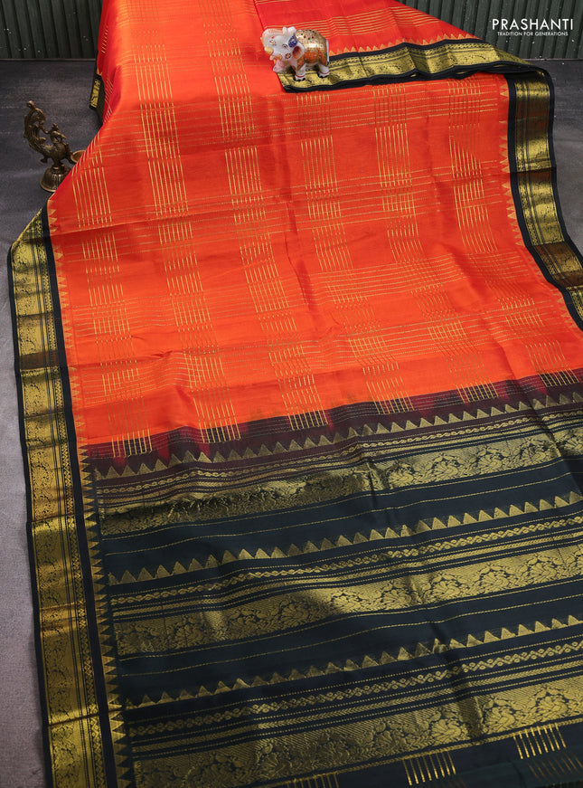 Silk cotton saree orange and black with allover zari checked pattern & buttas and zari woven korvai border