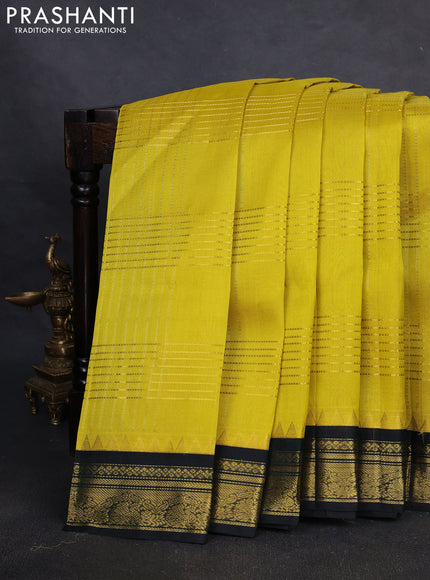 Silk cotton saree lime yellow and black with allover zari checked pattern & buttas and zari woven korvai border