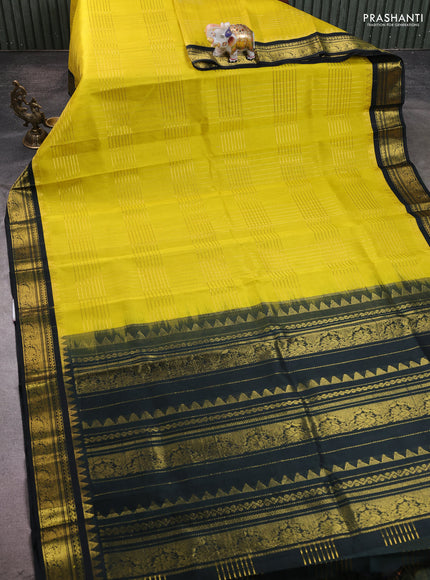 Silk cotton saree lime yellow and black with allover zari checked pattern & buttas and zari woven korvai border