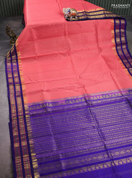 Silk cotton saree peach shade and blue with allover zari checked pattern & buttas and zari woven korvai border
