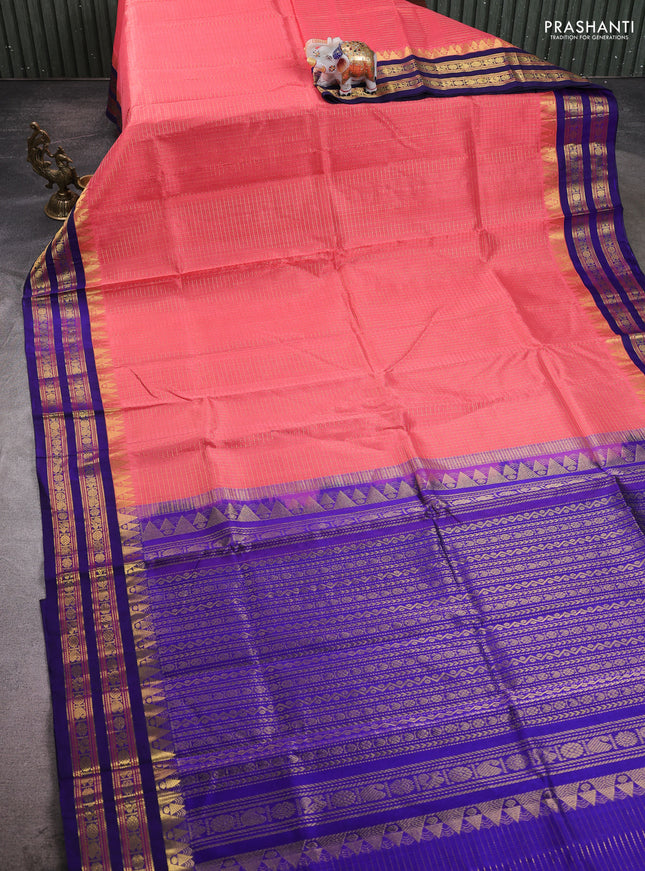 Silk cotton saree peach shade and blue with allover zari checked pattern & buttas and zari woven korvai border