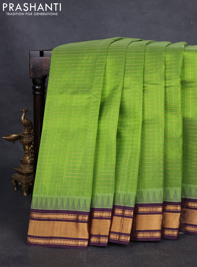 Silk cotton saree light green and deep wine with allover zari checked pattern and temple design zari woven border