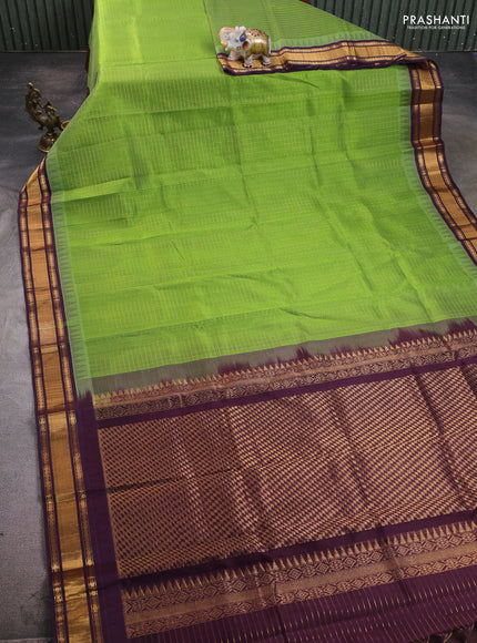 Silk cotton saree light green and deep wine with allover zari checked pattern and temple design zari woven border
