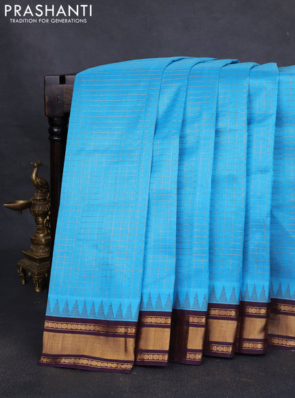 Silk cotton saree cs blue and deep wine with allover zari checked pattern and temple design zari woven border