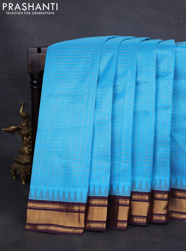 Silk cotton saree cs blue and deep wine with allover zari checked pattern and temple design zari woven border