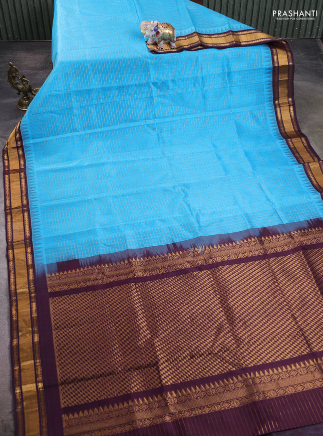 Silk cotton saree cs blue and deep wine with allover zari checked pattern and temple design zari woven border