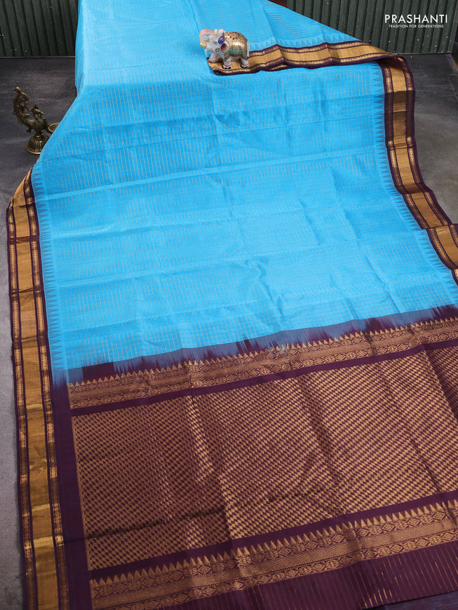 Silk cotton saree cs blue and deep wine with allover zari checked pattern and temple design zari woven border